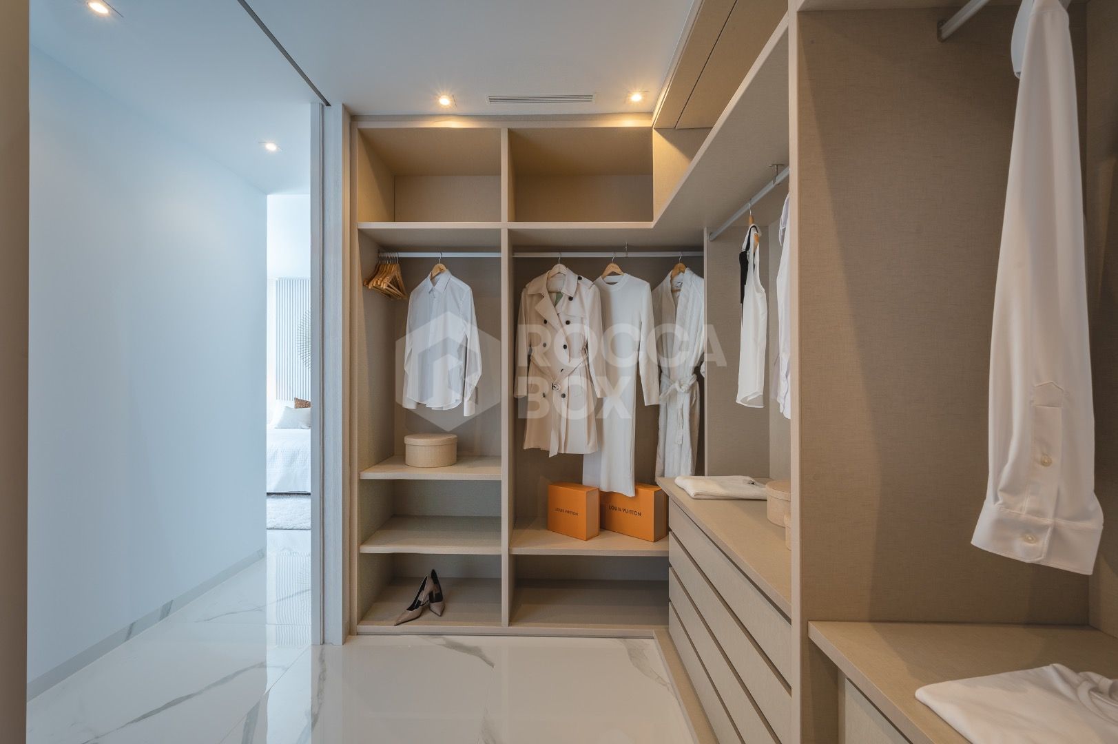 Sleek Corner Apartment with Panoramic Golf & Sea Views