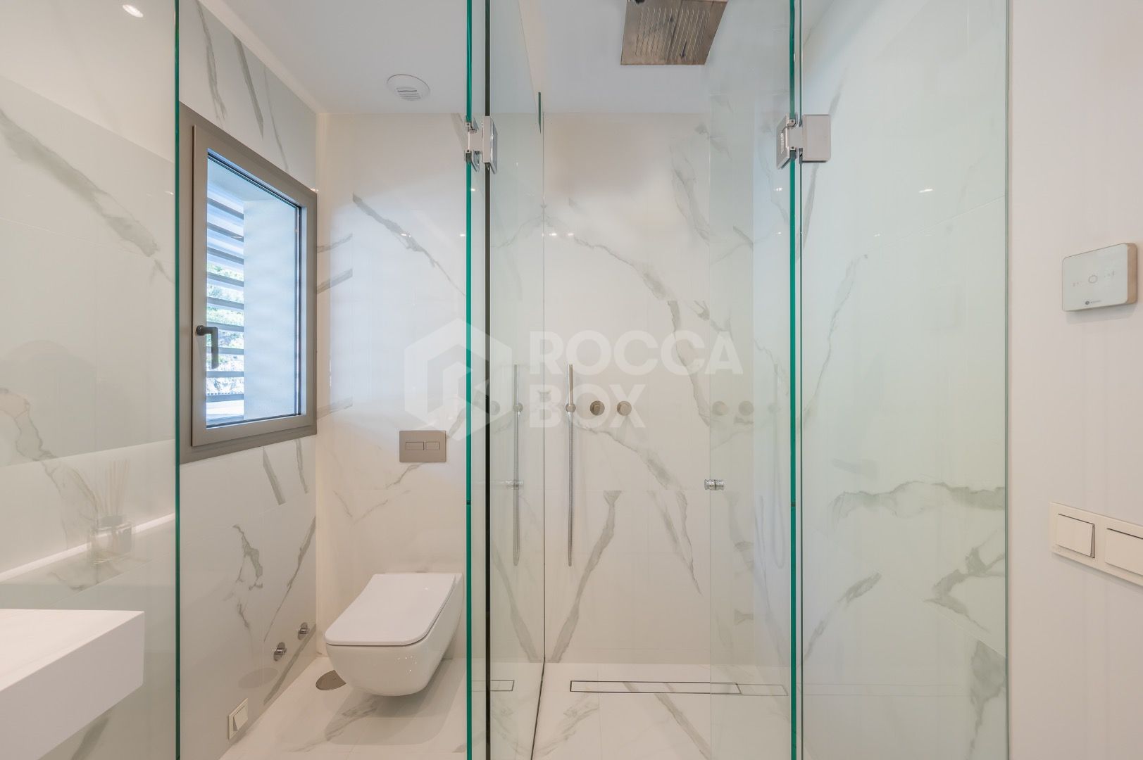 Sleek Corner Apartment with Panoramic Golf & Sea Views