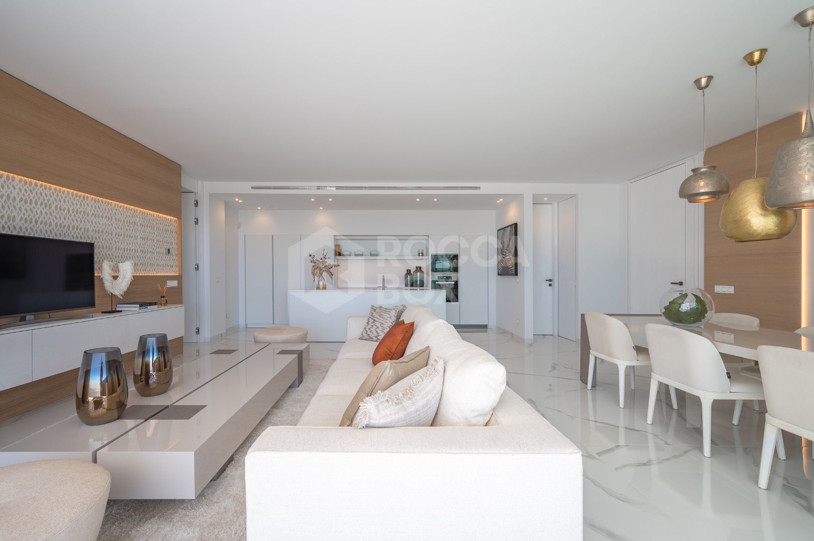 Sleek Corner Apartment with Panoramic Golf & Sea Views