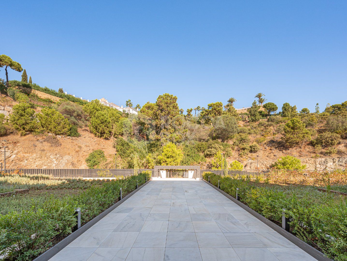 Sleek Corner Apartment with Panoramic Golf & Sea Views