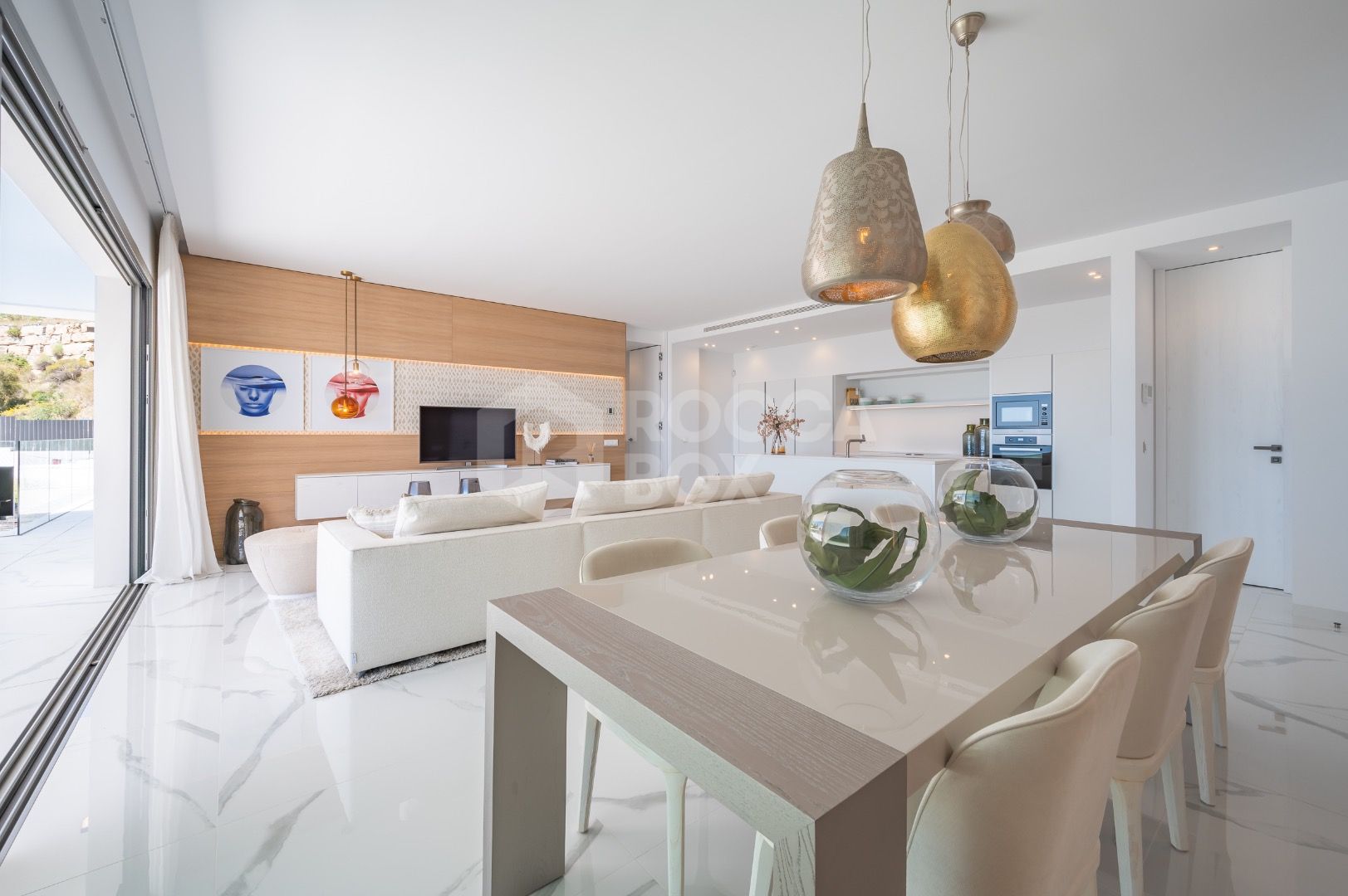 Sleek Corner Apartment with Panoramic Golf & Sea Views