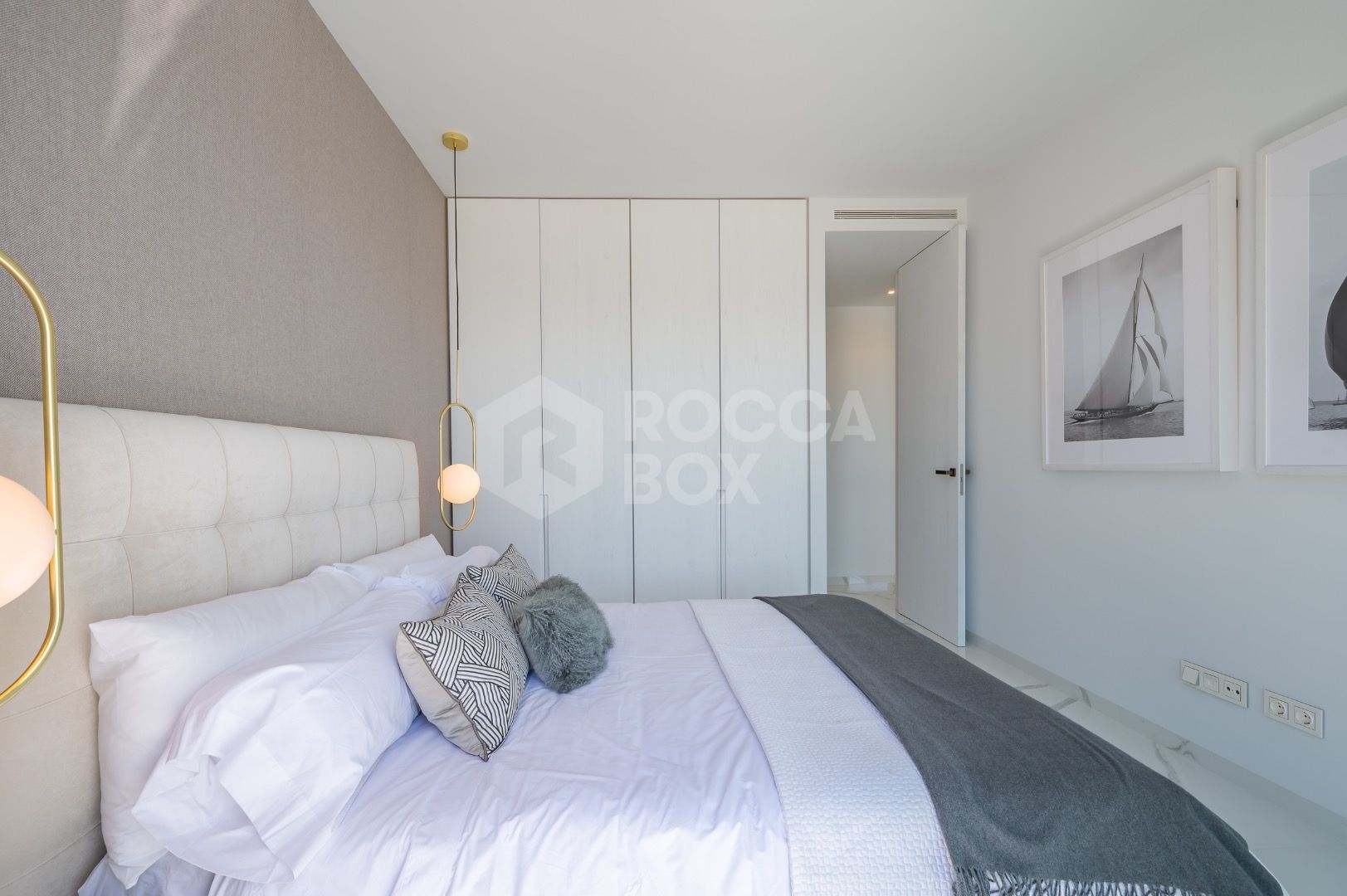 Sleek Corner Apartment with Panoramic Golf & Sea Views