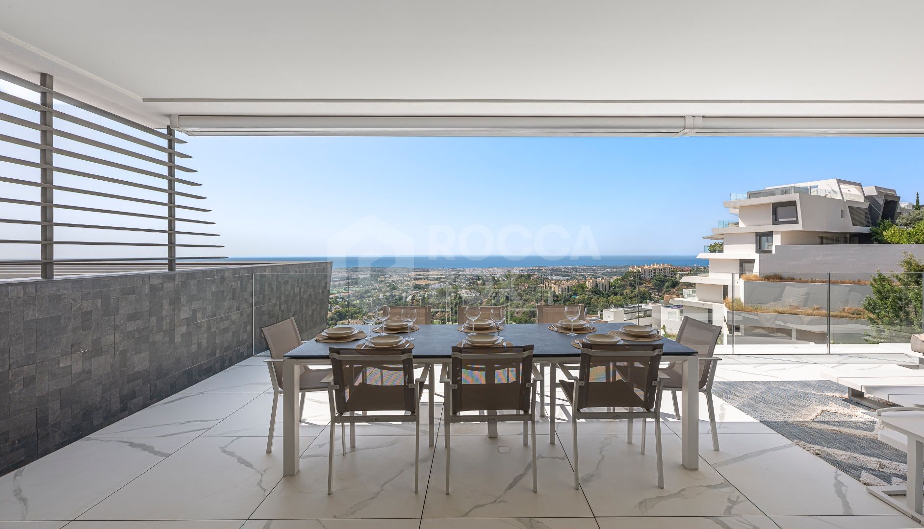 Sleek Corner Apartment with Panoramic Golf & Sea Views