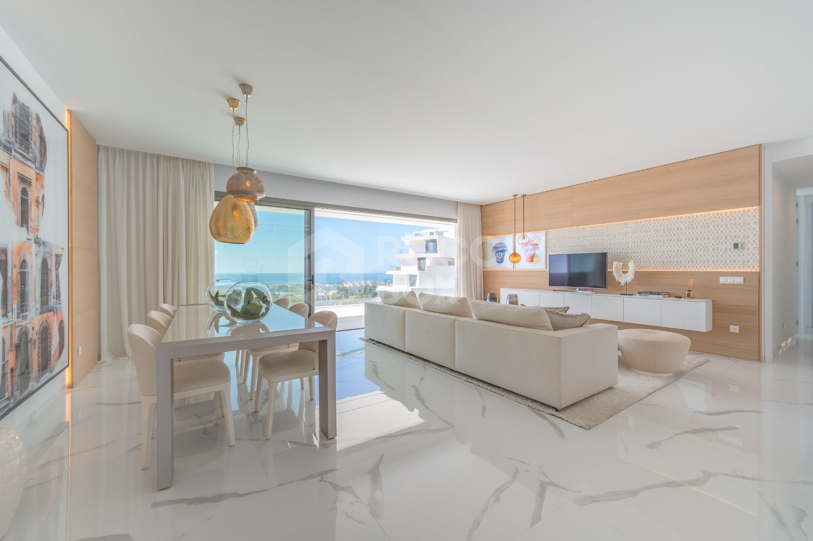 Sleek Corner Apartment with Panoramic Golf & Sea Views