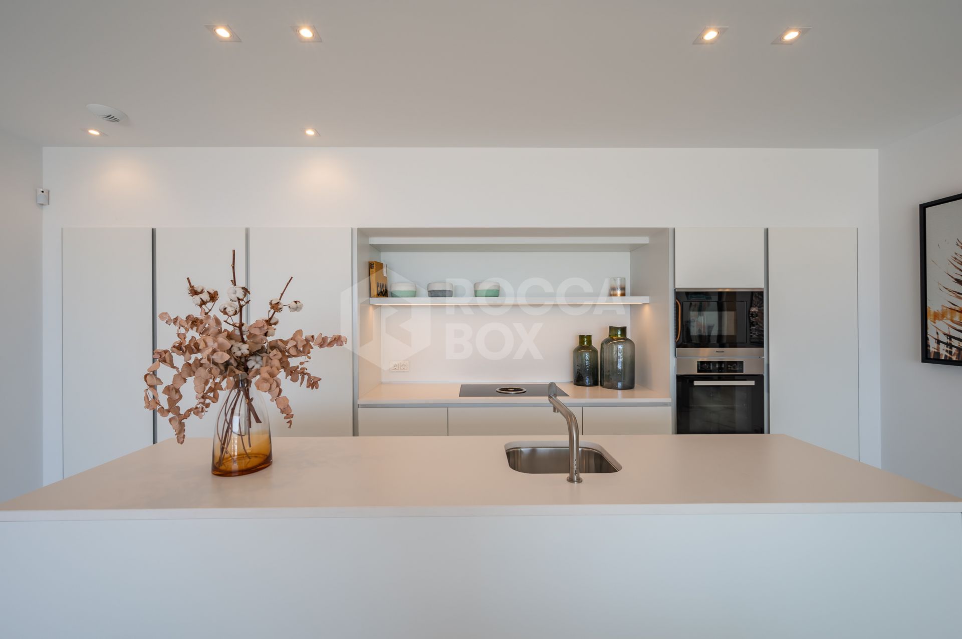 Sleek Corner Apartment with Panoramic Golf & Sea Views