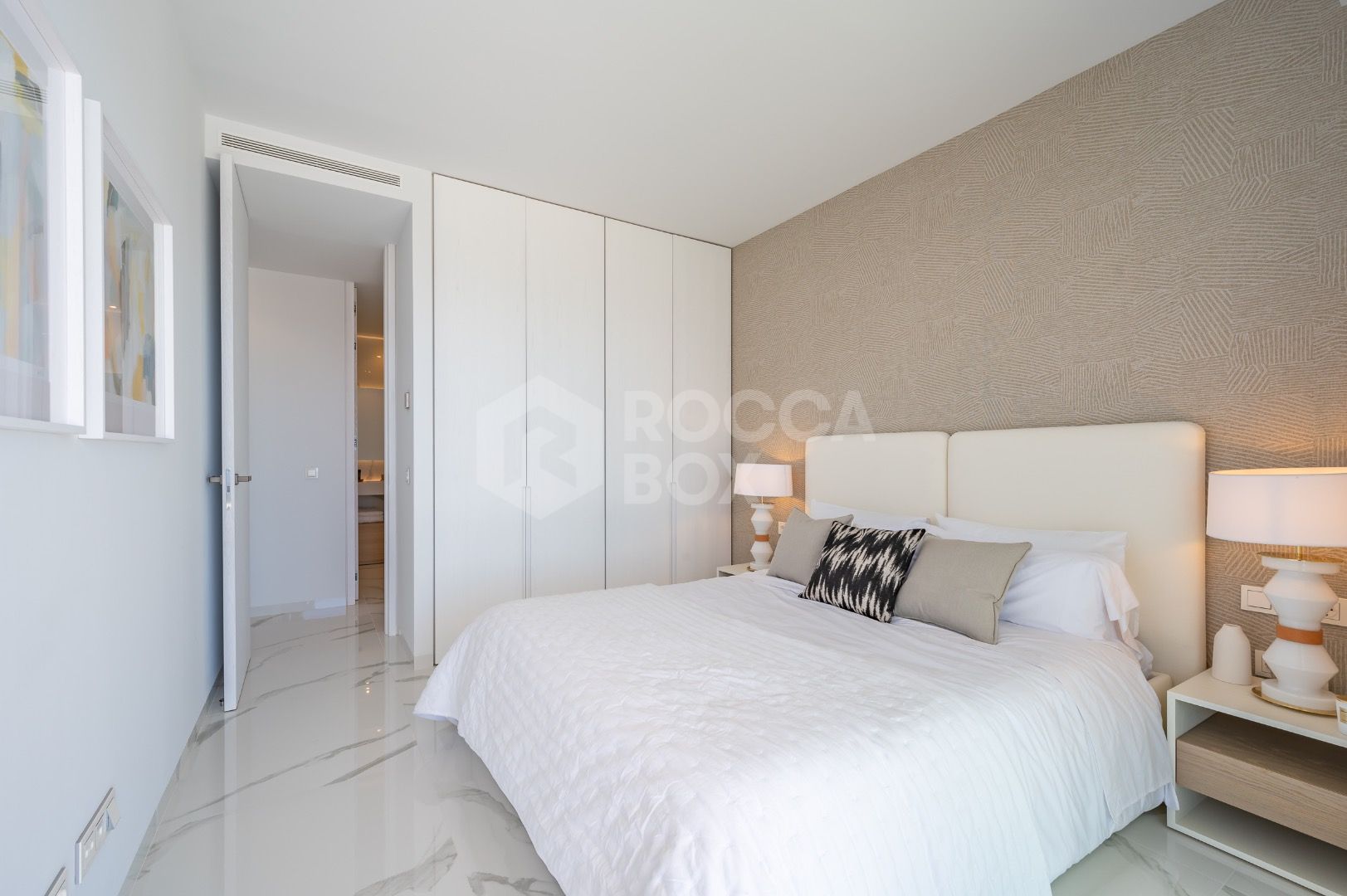 Sleek Corner Apartment with Panoramic Golf & Sea Views