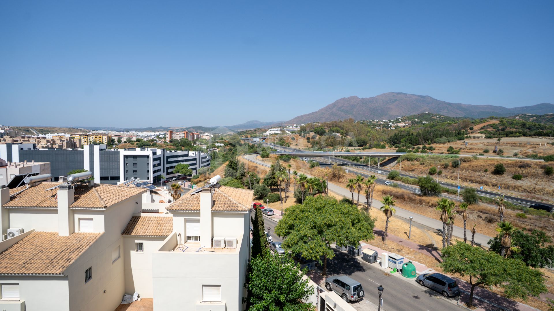 Charming Duplex Penthouse in Estepona Centre, Private Community with Mountain Views