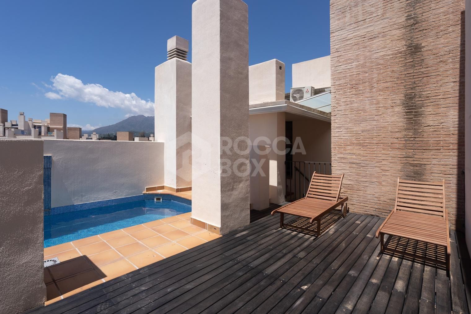 Charming Two-Bedroom Duplex Penthouse in New Golden Mile, Estepona