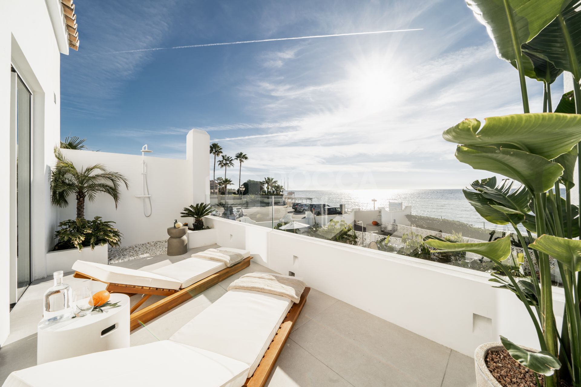 Exquisite Beachfront Townhouse with Hawaiian-Inspired Elegance and Sea Views