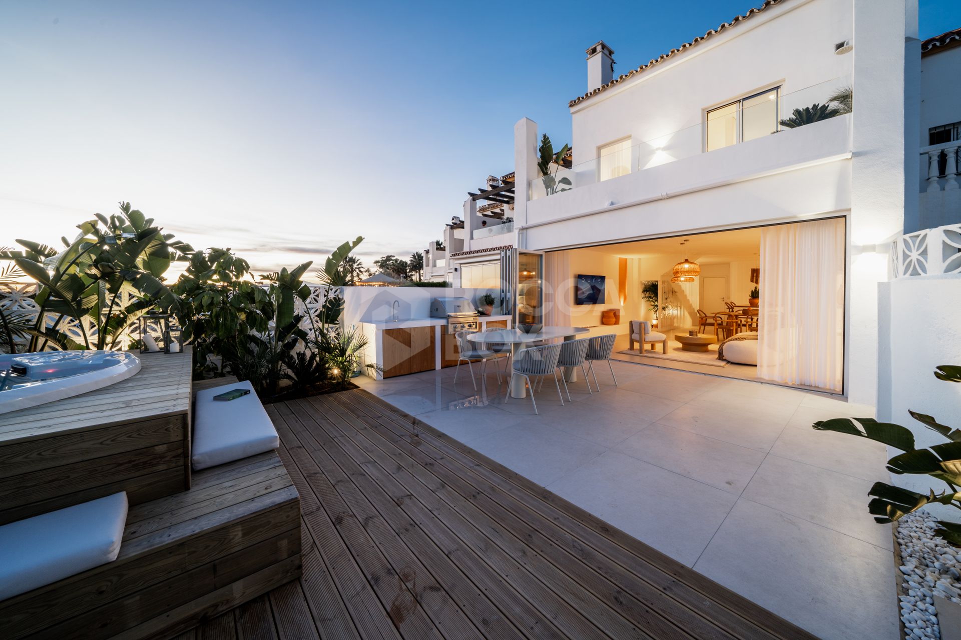 Exquisite Beachfront Townhouse with Hawaiian-Inspired Elegance and Sea Views