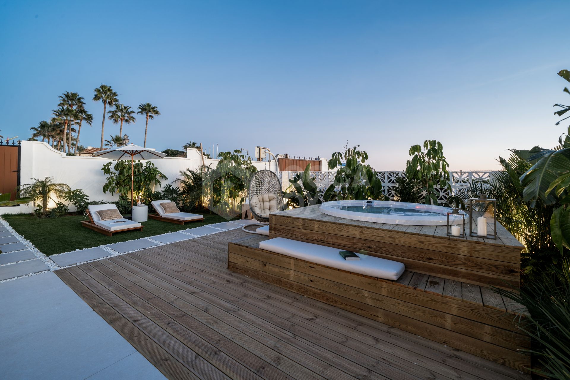 Exquisite Beachfront Townhouse with Hawaiian-Inspired Elegance and Sea Views