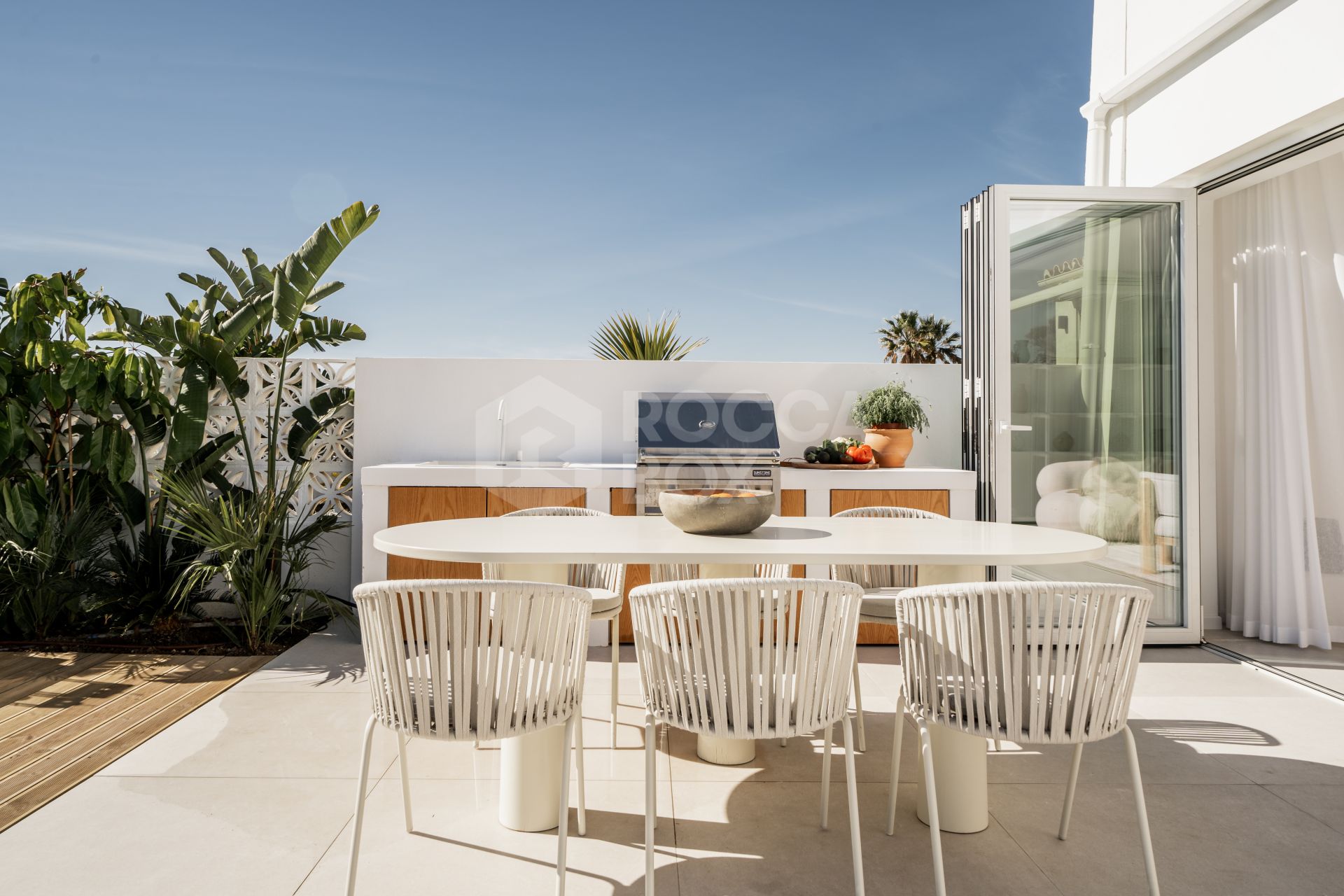 Exquisite Beachfront Townhouse with Hawaiian-Inspired Elegance and Sea Views