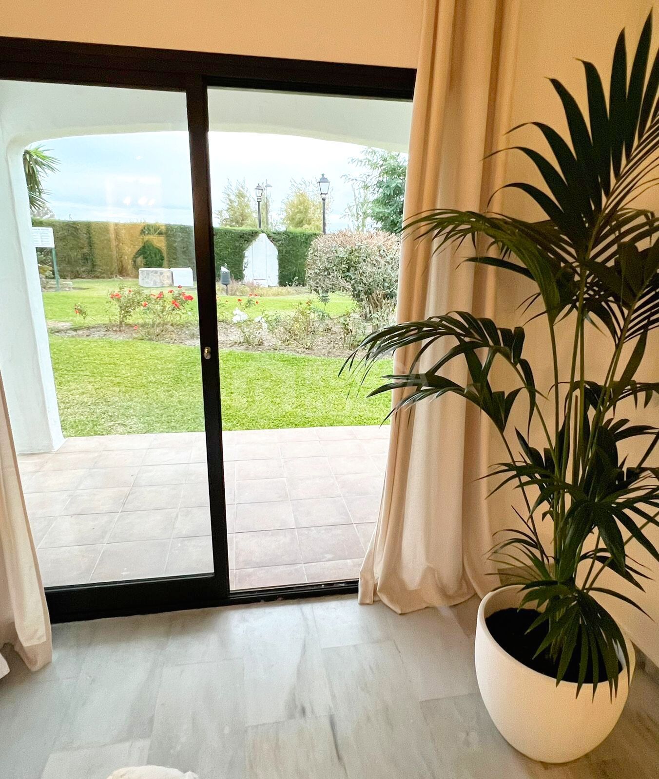 Elegant Townhouse with Sea View Terrace in Estepona