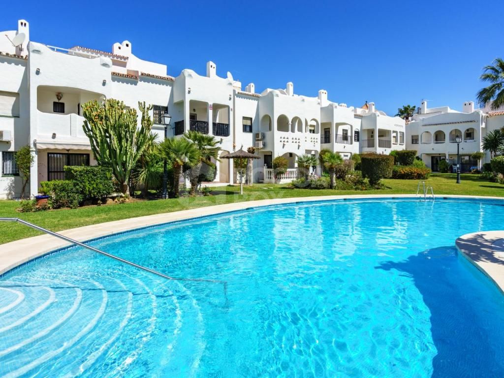 Elegant Townhouse with Sea View Terrace in Estepona