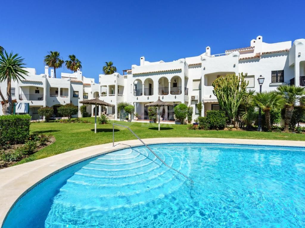 Elegant Townhouse with Sea View Terrace in Estepona