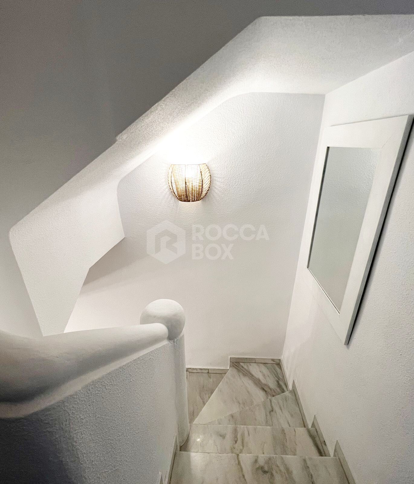Elegant Townhouse with Sea View Terrace in Estepona