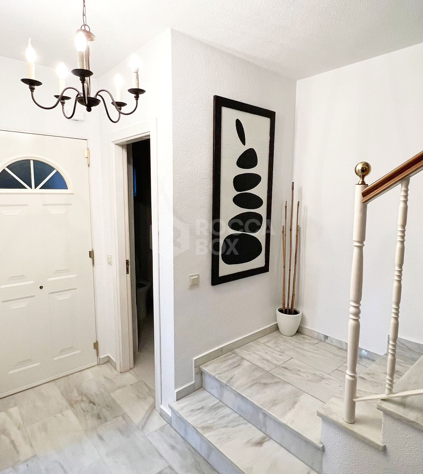 Elegant Townhouse with Sea View Terrace in Estepona