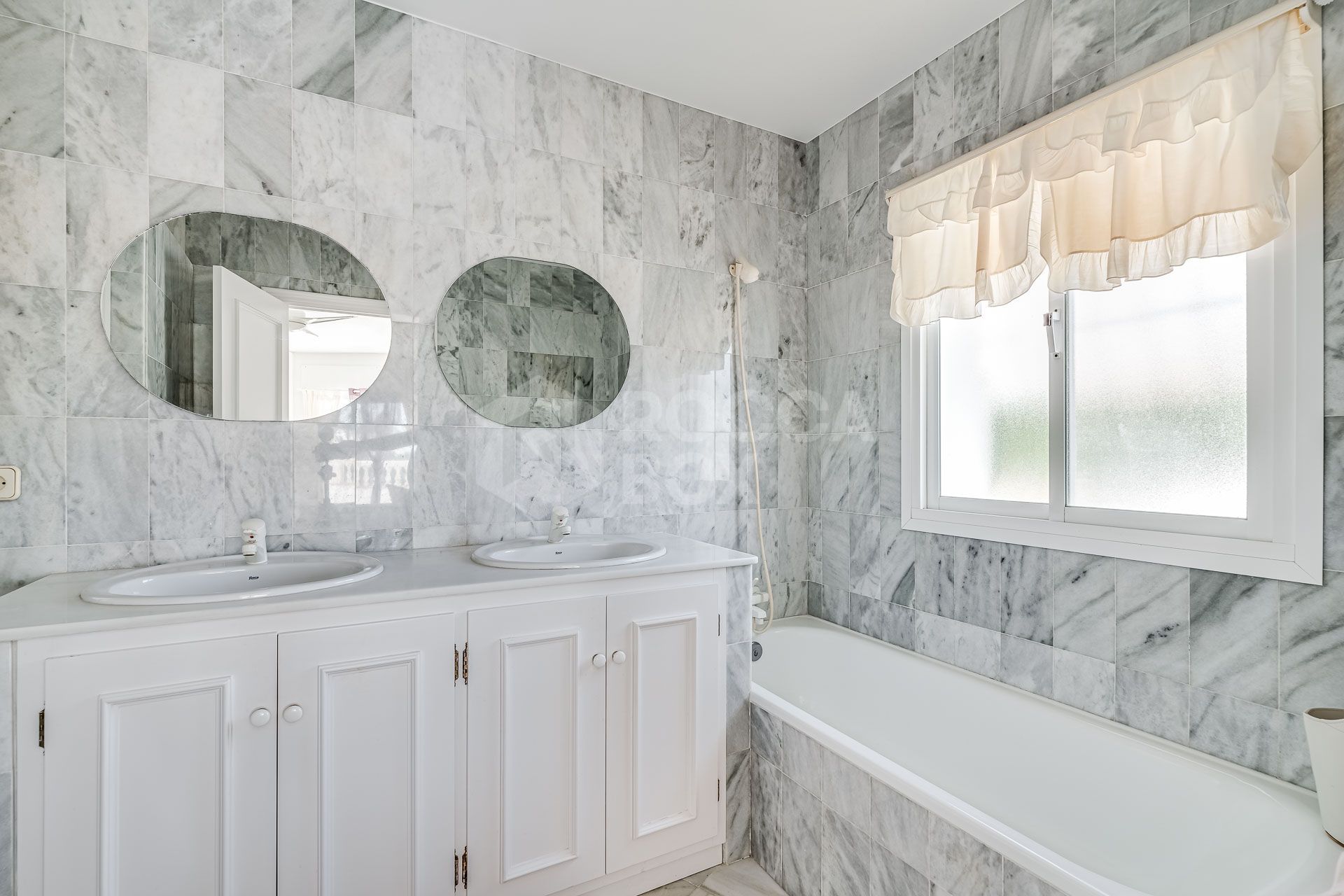 Elegant Estate with Vast Potential