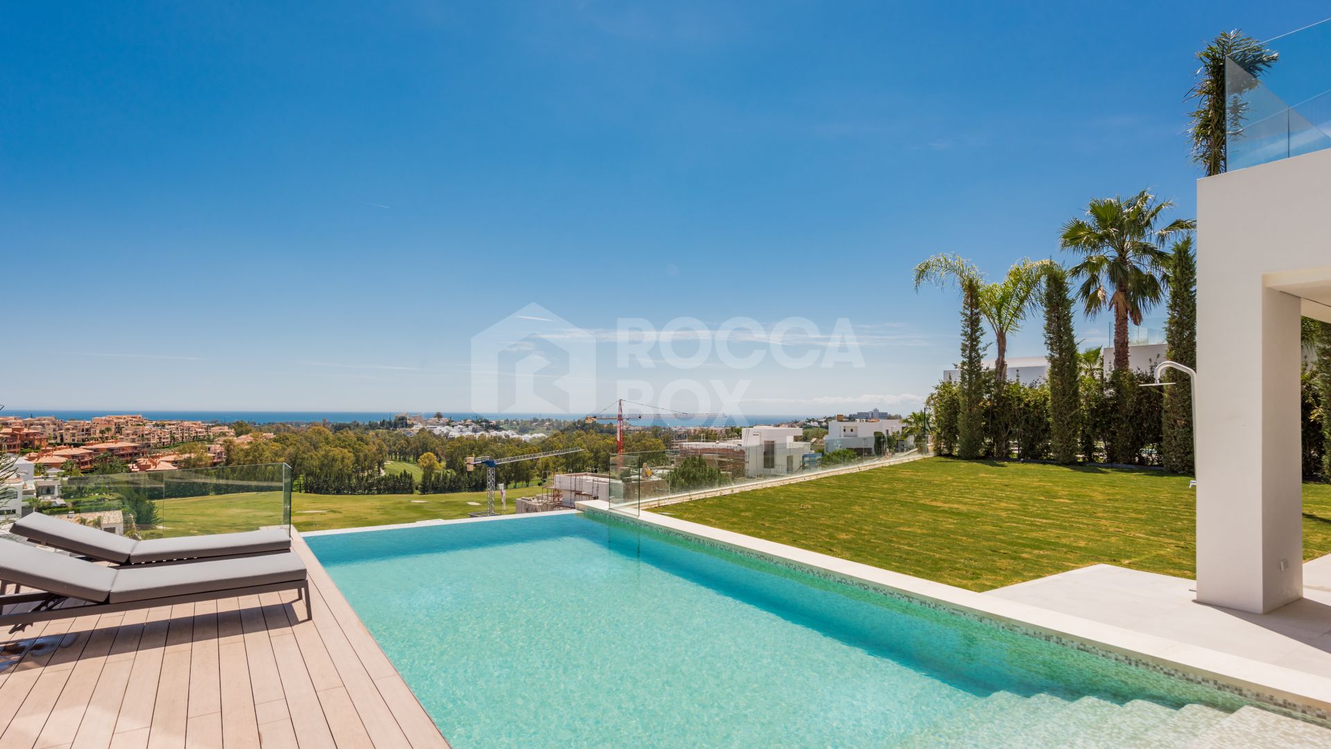 A SPECTACULAR 6 BEDROOM CONTEMPORARY VILLA WITH AMAZING VIEWS OF THE GOLF AND MEDITERRANEAN.