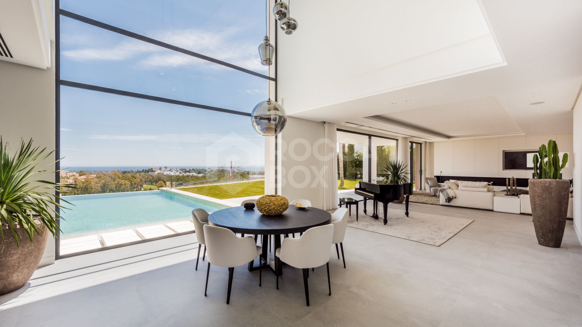 A SPECTACULAR 6 BEDROOM CONTEMPORARY VILLA WITH AMAZING VIEWS OF THE GOLF AND MEDITERRANEAN.