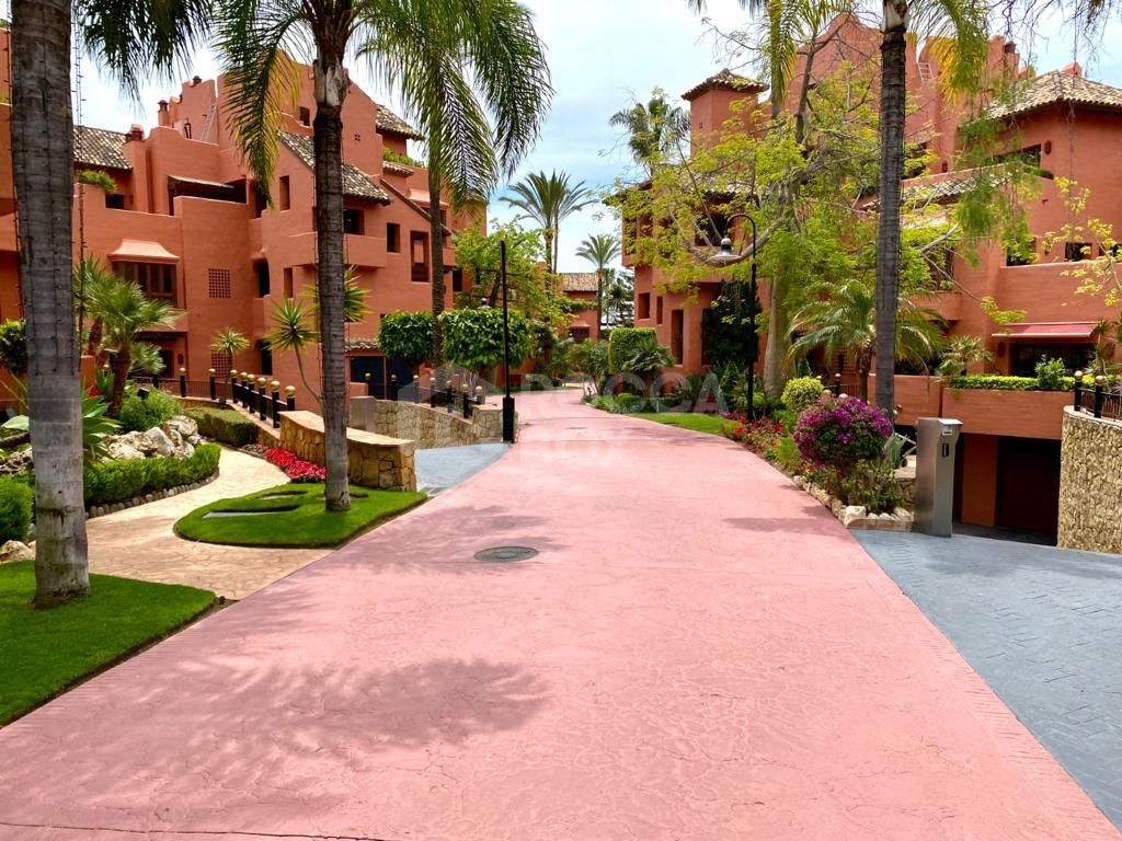 Luxurious Ground Floor Apartment in Torre Bermeja, Estepona: Beachfront Living with Unparalleled Amenities