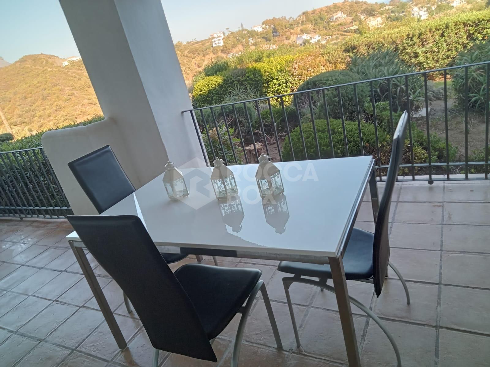 Spacious Ground Floor Apartment in Altos de La Quinta, Benahavis with Stunning Views and Potential for Renovation.