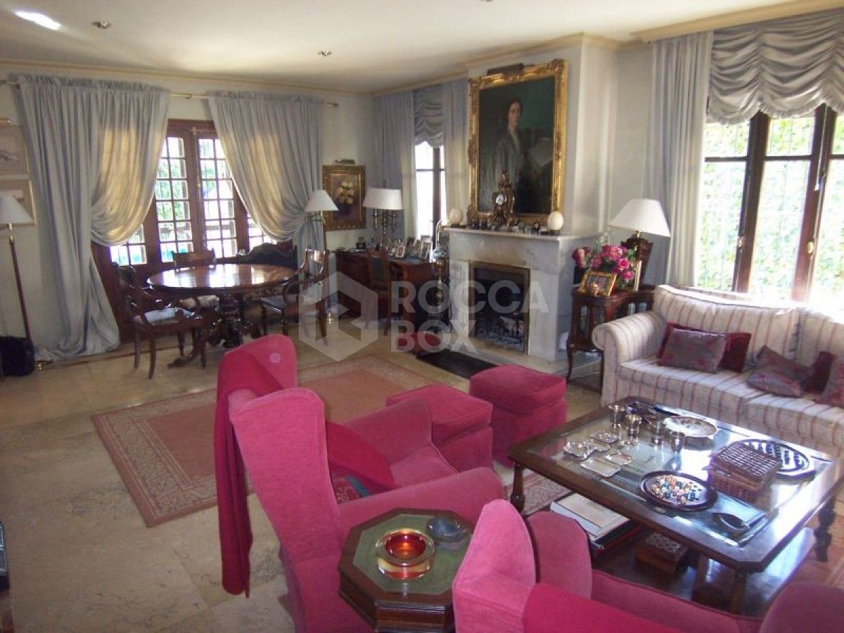 Andalucian style four bedroom villa for sale in Marbella.