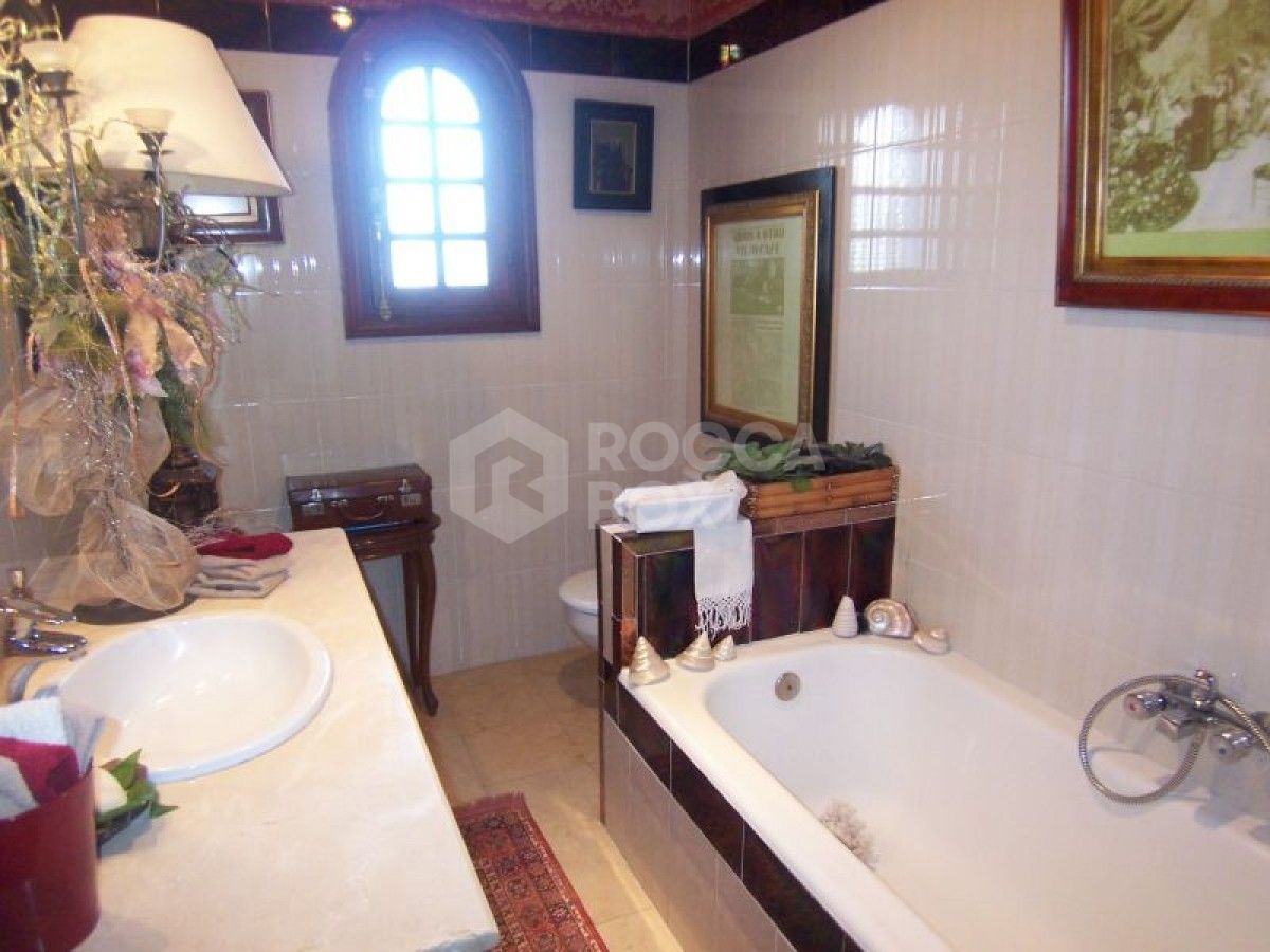 Andalucian style four bedroom villa for sale in Marbella.