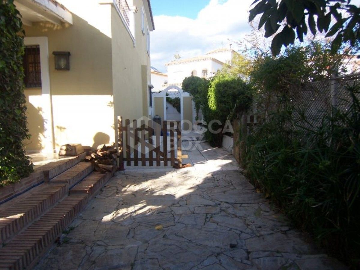 Andalucian style four bedroom villa for sale in Marbella.