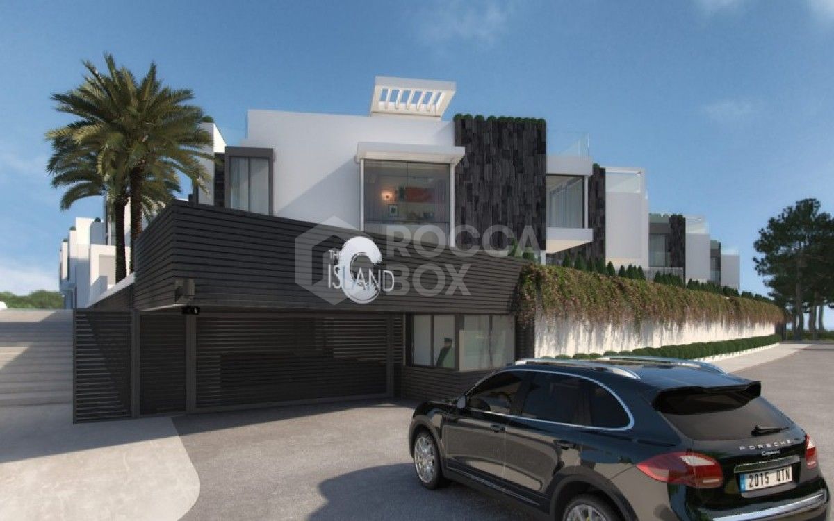 Exclusive contemporary style 1st line beach townhouse setting in Estepona