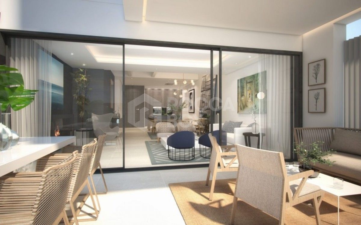 Exclusive contemporary style 1st line beach townhouse setting in Estepona