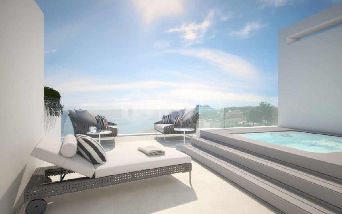 The island estepona is an Exclusive contemporary style 1st line beach townhouse setting in Estepona