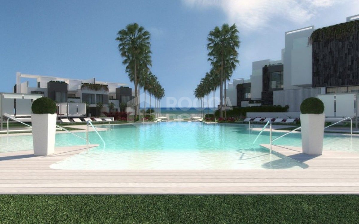 The island estepona is an Exclusive contemporary style 1st line beach townhouse setting in Estepona