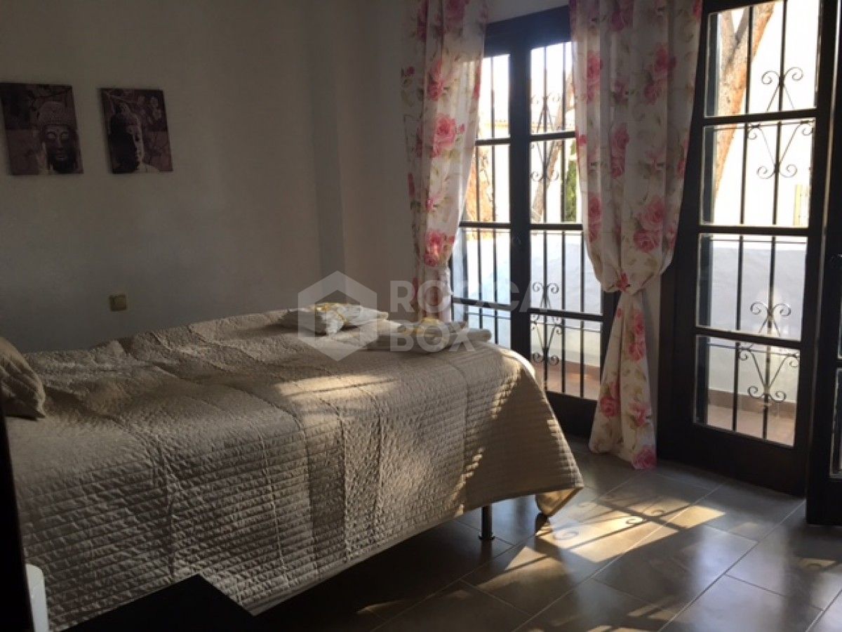 A three bedroom penthouse in Los Pinos de Aloha for sale