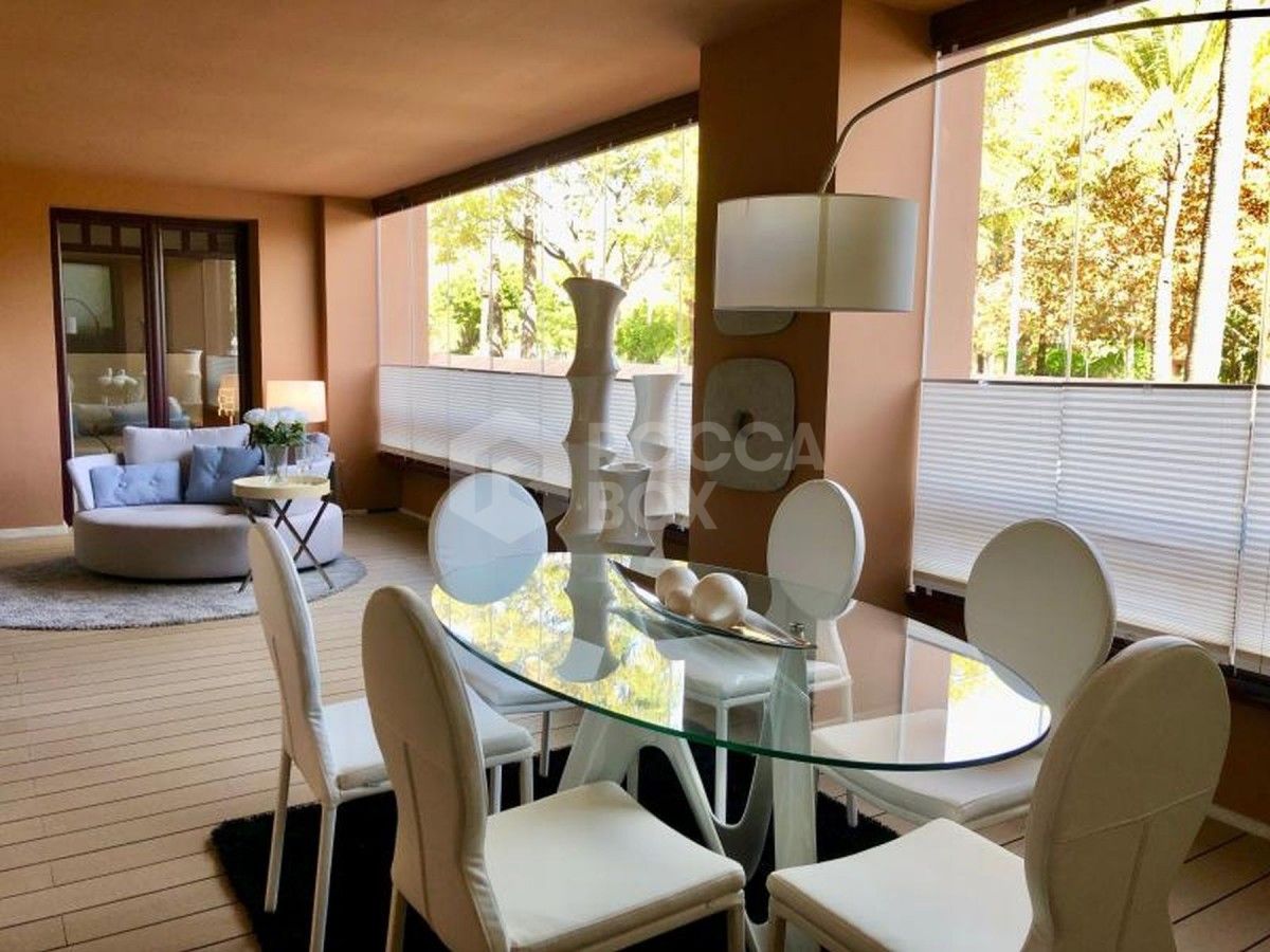 This beachside ground floor apartment in Casablanca Beach for sale