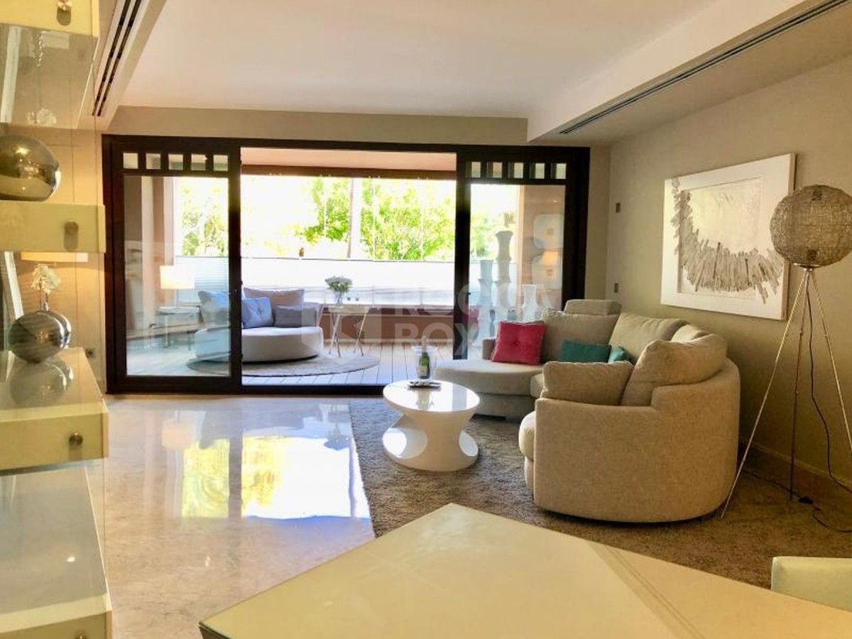 This beachside ground floor apartment in Casablanca Beach for sale