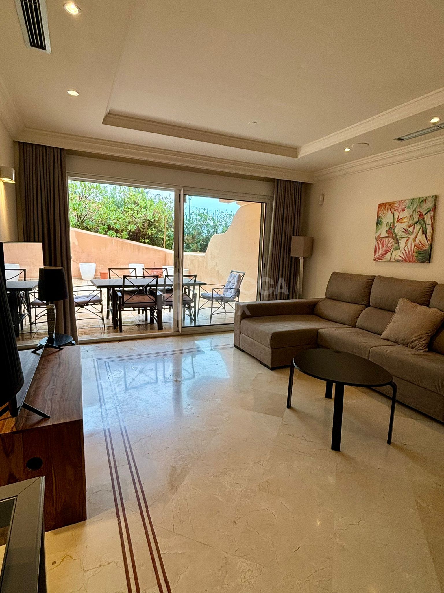 Ground Floor Apartment with Expansive Terrace and Prime Amenities