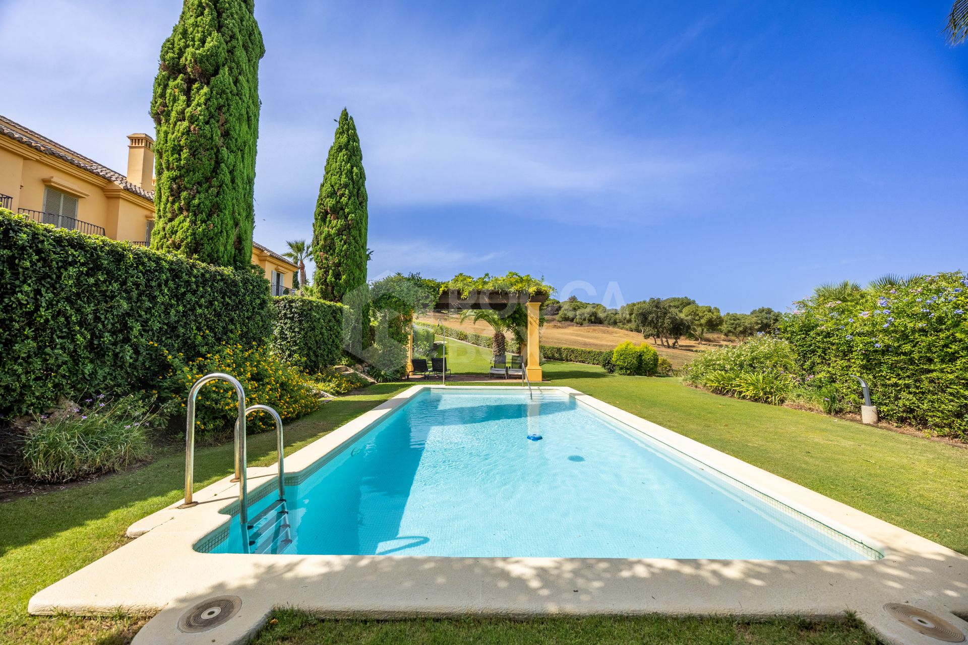 Exclusive Semi-Detached House with 4 bedrooms on the Frontline of Golf in Sotogrande – with Private Garden