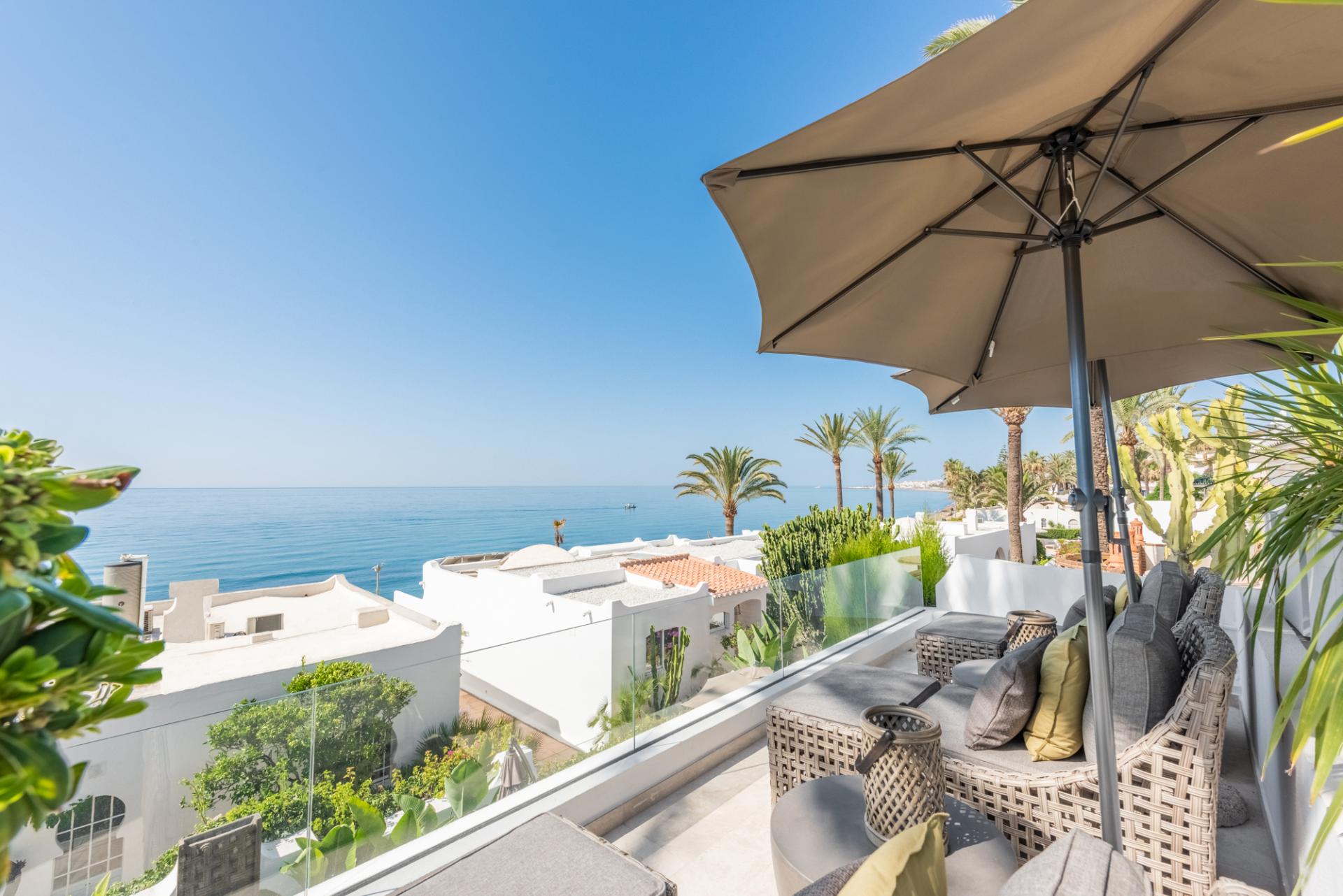 Scandi-style design bungalow in the beachfront Oasis Club on Marbella's Golden Mile.