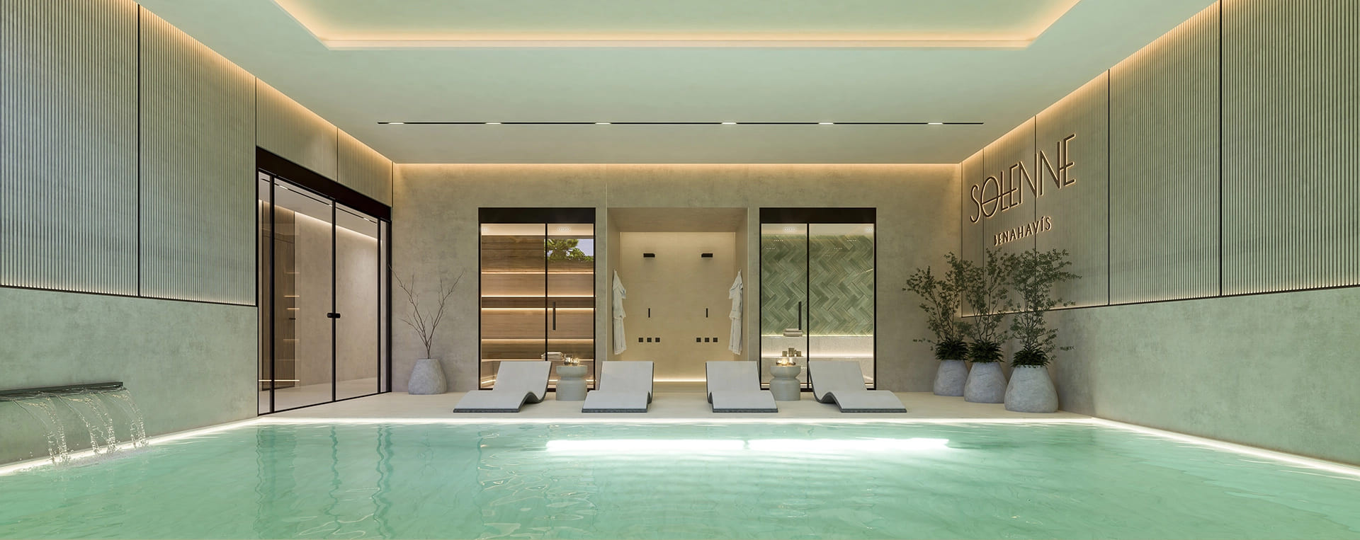 Indoor swimming pool with three lounge chairs, a waterfall feature, and an illuminated wall sign for Solenne Benahavis.
