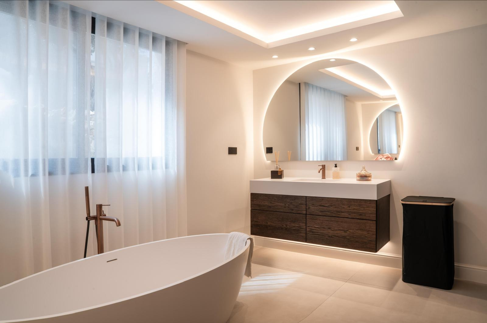 Second angle of the bathroom showing the same fixtures with added detail of decor items.