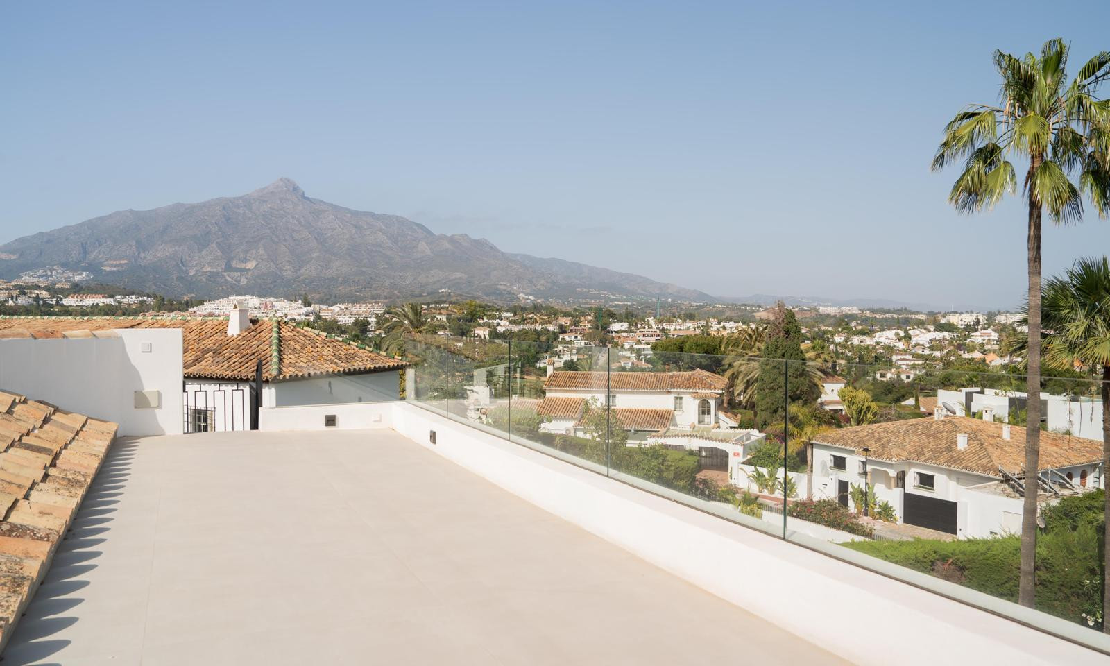 Rooftop terrace with a panoramic view of the surrounding area.