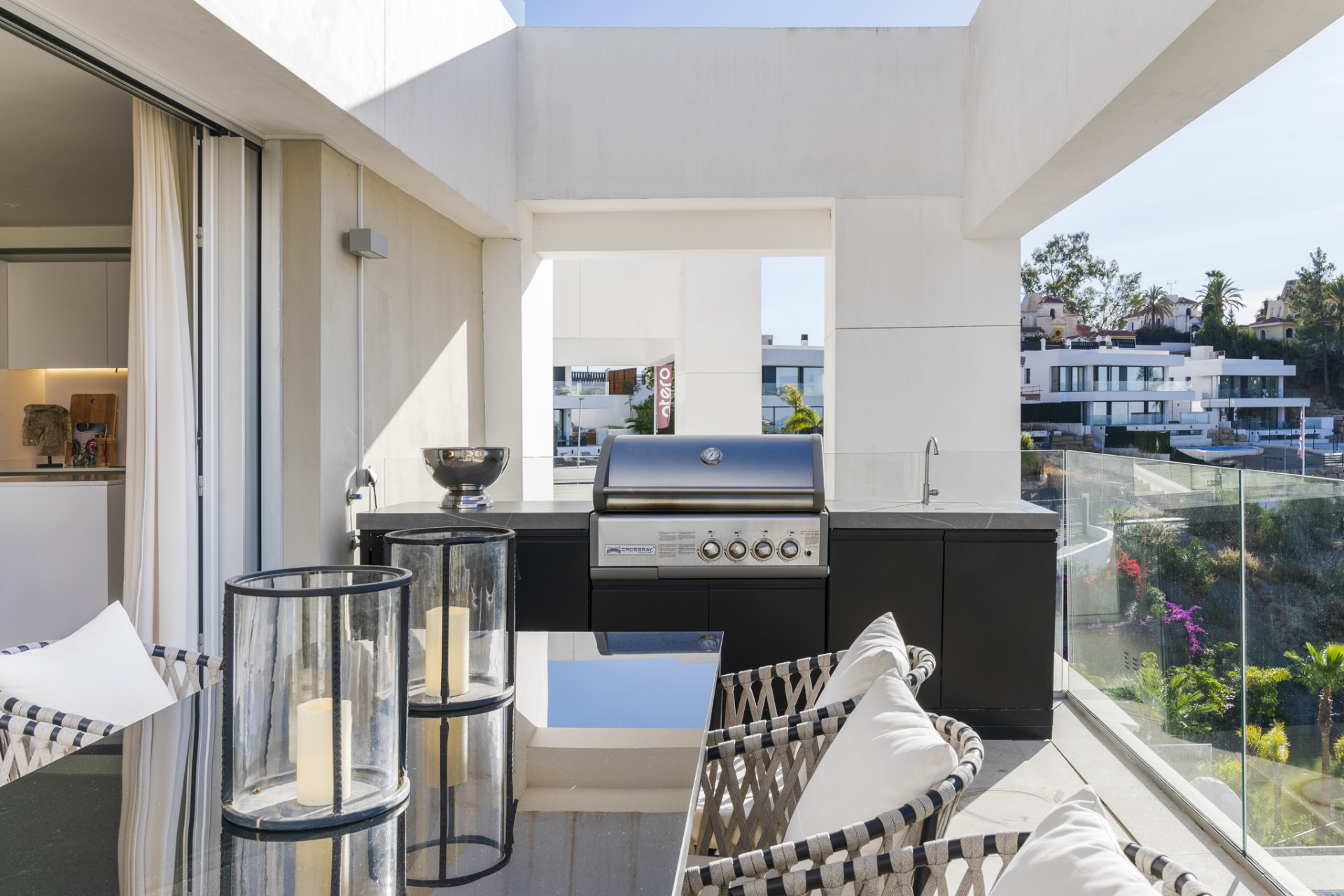 Terrace featuring a barbecue and seating area.