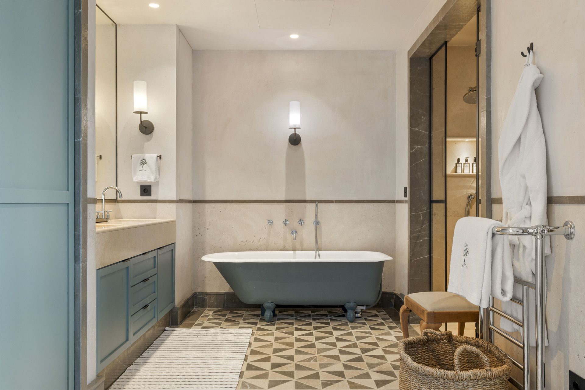 Elegant bathroom with a freestanding tub and modern fixtures.
