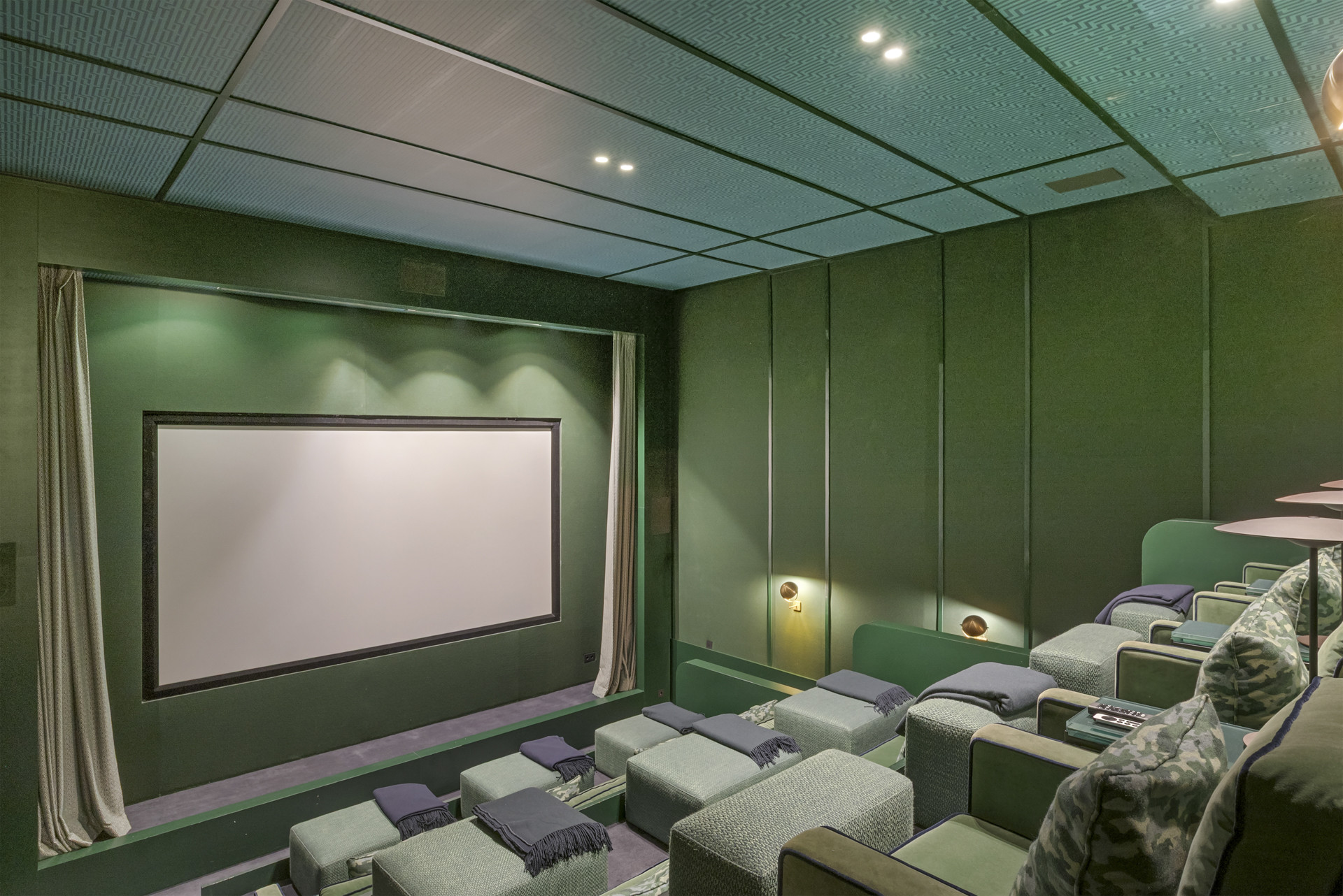 Theater space showcasing a large screen and ample seating.