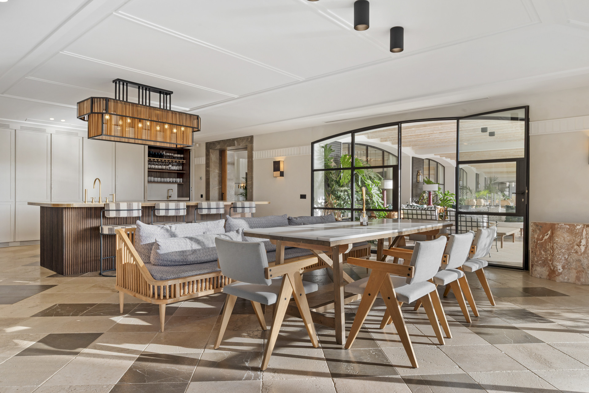 Inviting dining area showcasing a large table with stylish chairs and open views.