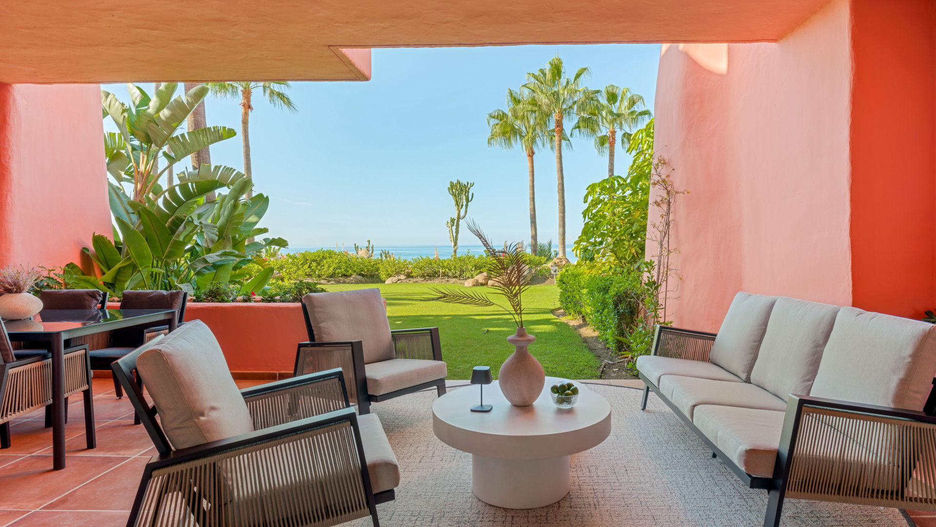 Outstanding groundfloor apartment offering 5-star beachfront living with security, pools, gym, and sea views