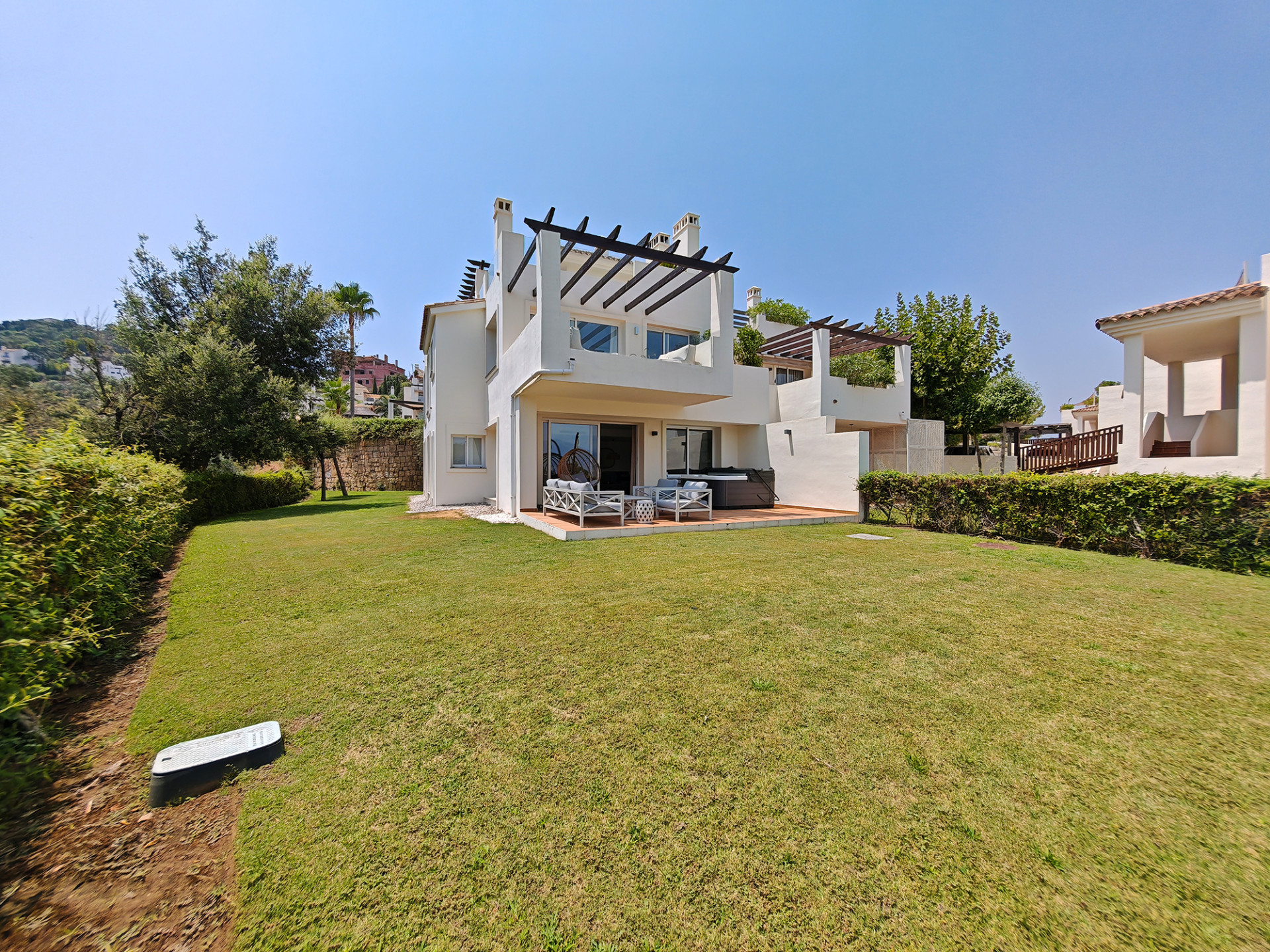 Luxury south-facing ground floor apartment for sale in La Mairena, Marbella East