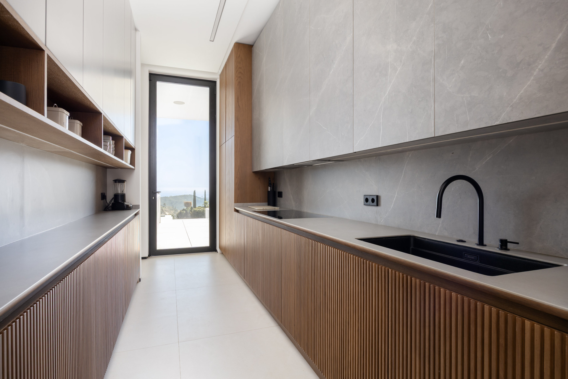 Casa De Canto is an exceptional seven-bedroom contemporary estate, in prestigious gated community of El Madroñal.