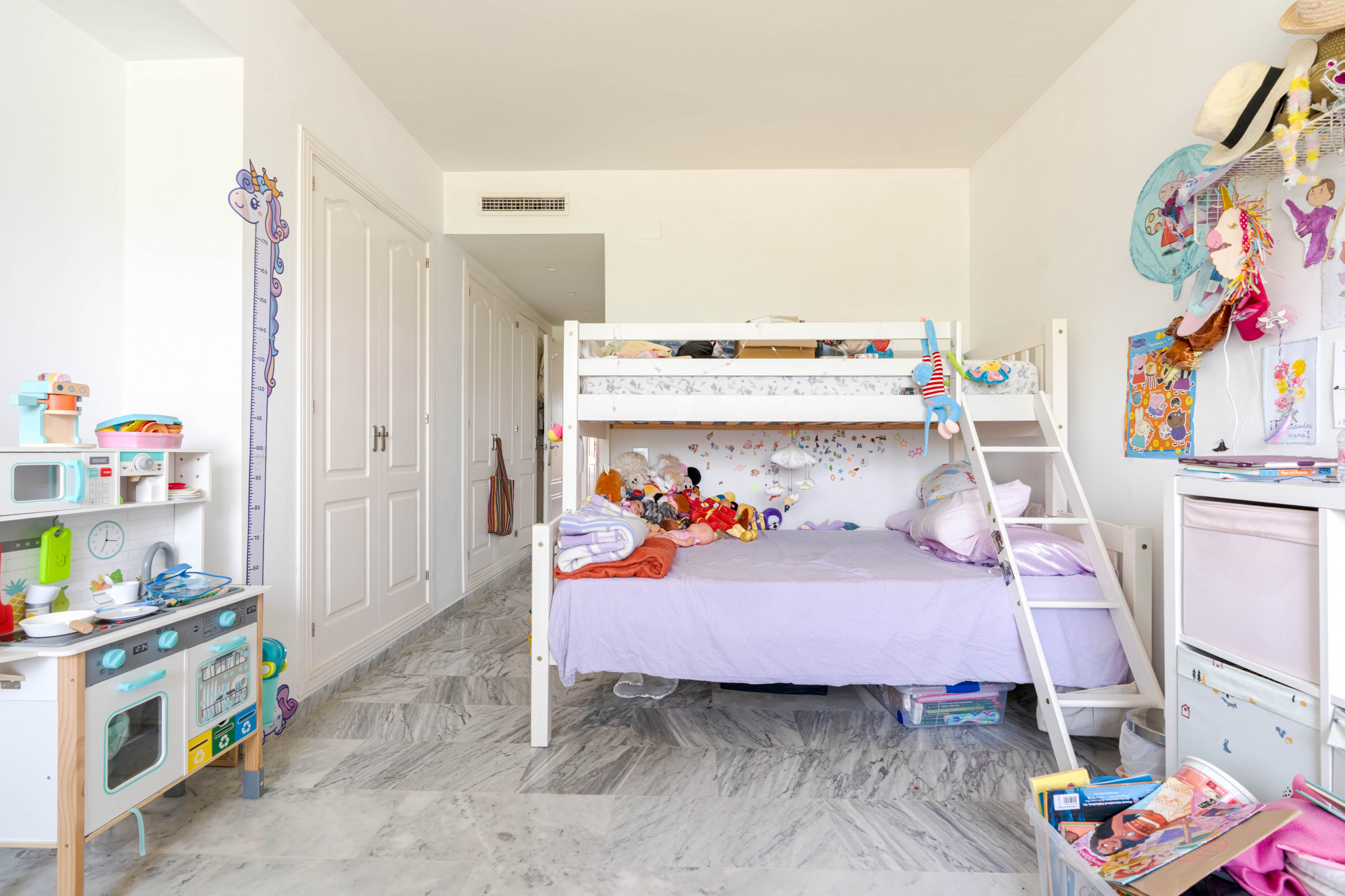 Elegant 3-bedroom first-floor apartment in prestigious Guadalmina Baja, just minutes from the beach. Spacious interiors, 55 m² terrace, stunning gardens, and lagoon-style pool in a secure community.